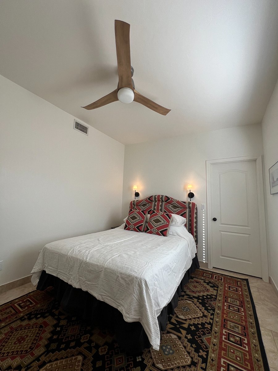 2nd bedroom featuring custom       Southwestern headboard 