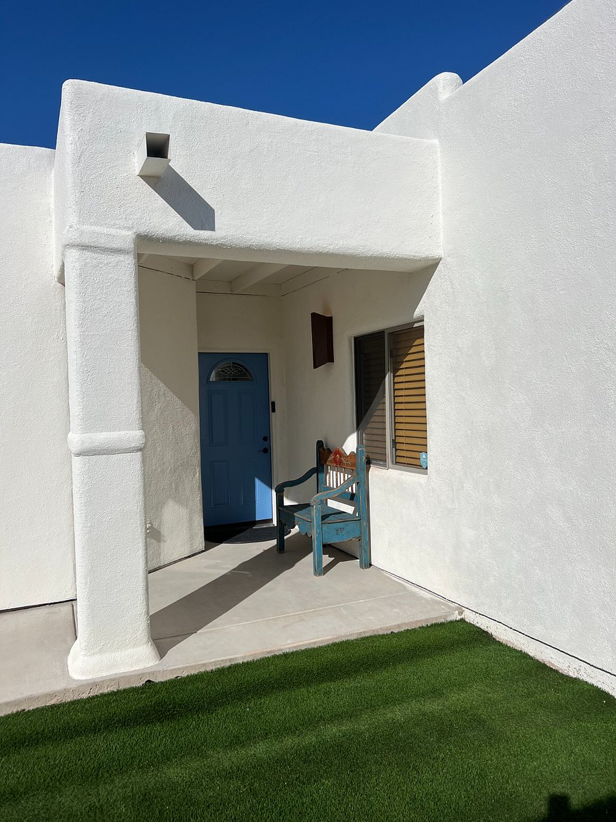 Front door entrance tucked in around the corner for privacy and package deliveries.