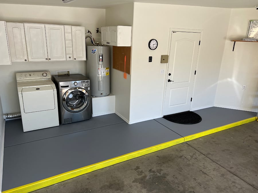 Laundry area in the attached 2 car garage.