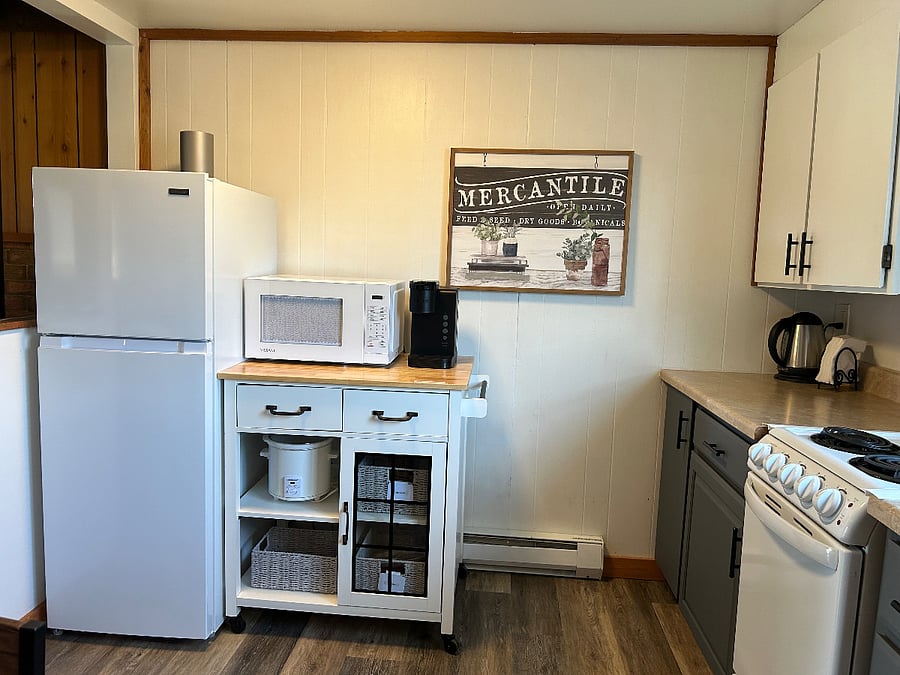 kitchen: refrigerator, microwave, Keurig coffee maker, toaster, blender provided. No dishwasher. 