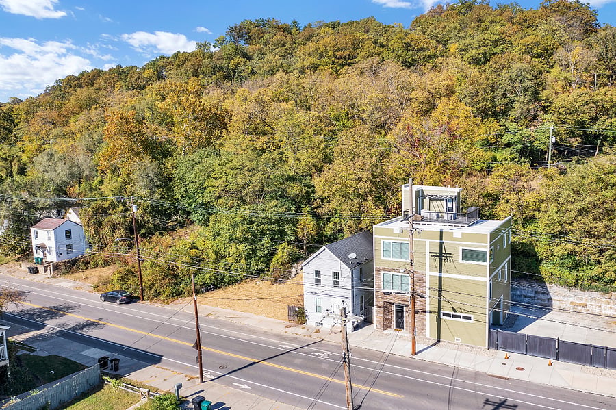 Modern furnished home along scenic Riverside Drive surrounded by nature yet close to everything.