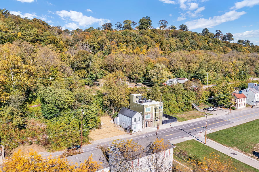 Modern furnished home along scenic Riverside Drive surrounded by nature yet close to everything.