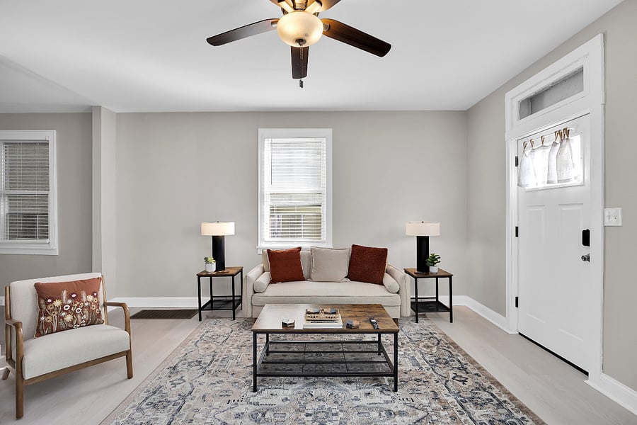 Cozy living room with 65" TCL 4K Smart Google TV, high-speed Wi-Fi, and modern decor perfect for relaxing after work.