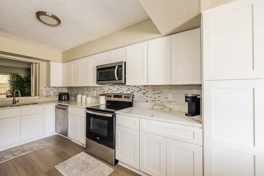 Full kitchen with modern appliances, ample cabinet space, and updated finishes.