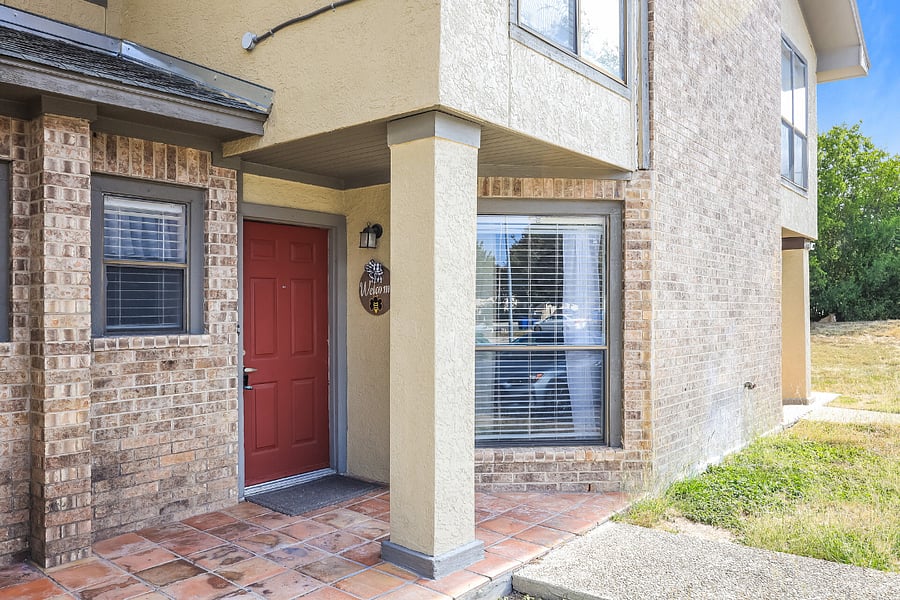 Private front entry with secure smart lock for keyless access.