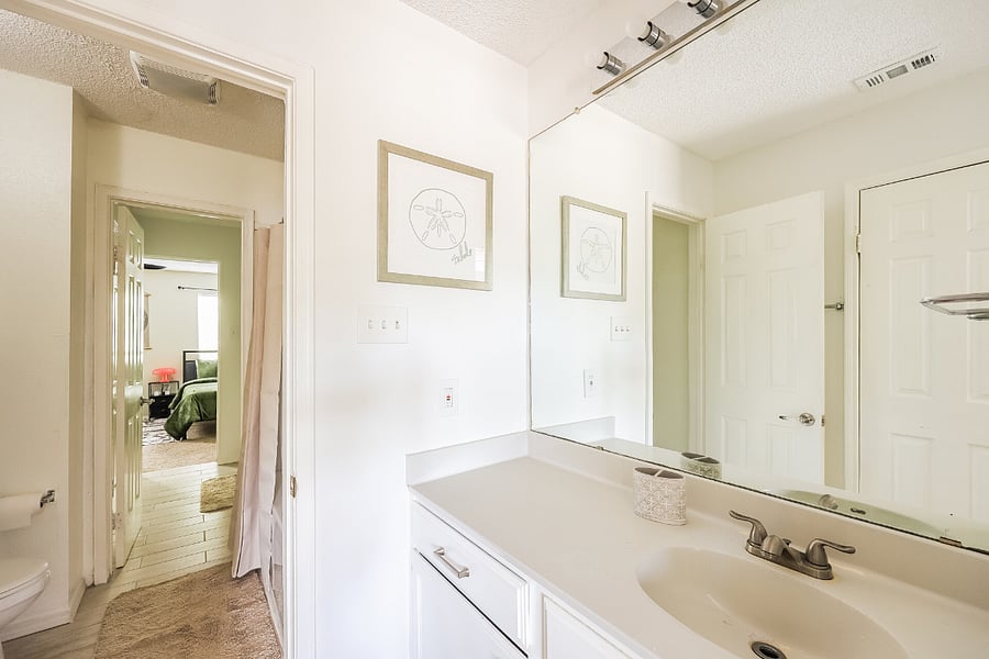 Jack-and-Jill bathroom upstairs providing convenient access from both bedrooms.