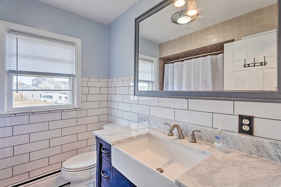 Upstairs full bath with tub. Updated 2022