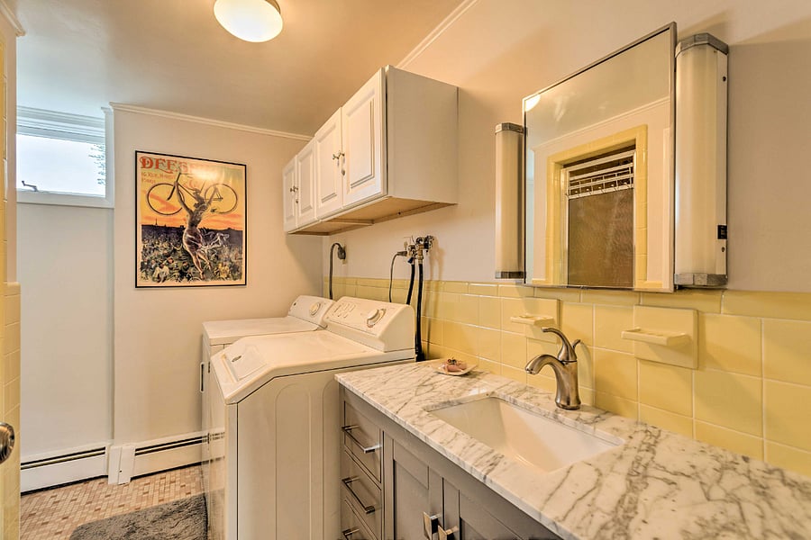 Downstairs full bath stall shower, washer and dryer. Updated 2022