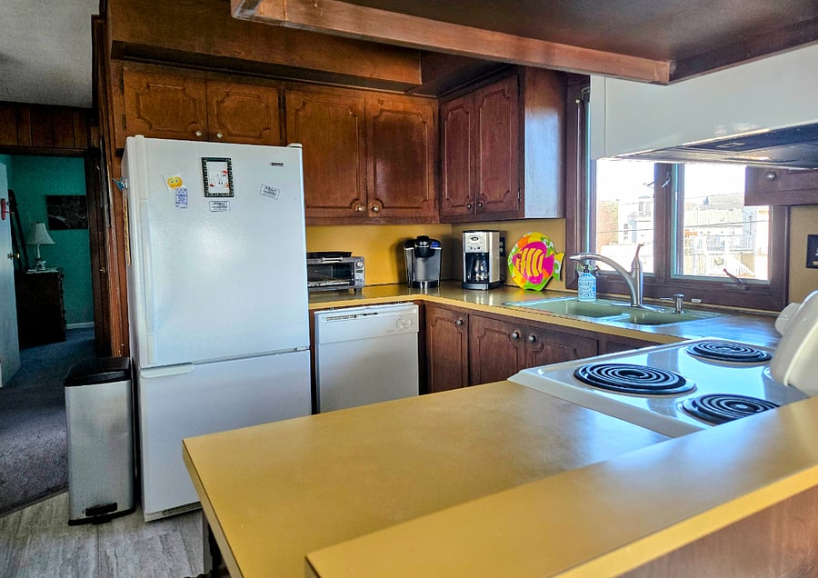 Kitchen with dishwasher, 2 coffee pots, toaster oven
