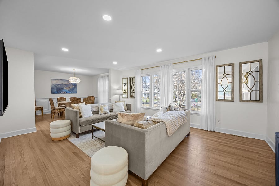 Family Room with a view to the dining room. Plenty of seating for all to enjoy!