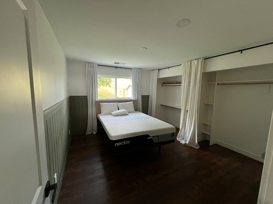 Second bedroom 13 x 12. New queen size bed and dual closet.