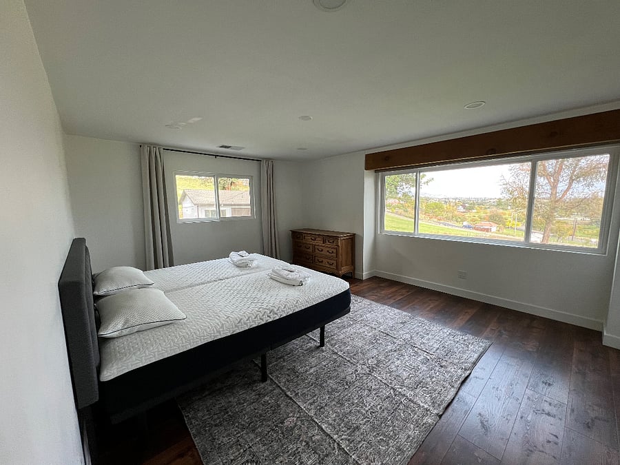 Master bedroom with new split king mattress.