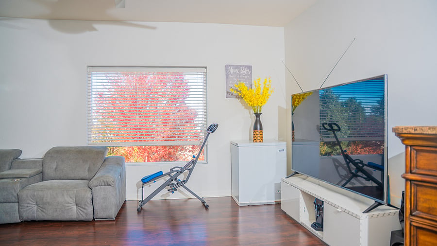 loft/movie room with exercise machine