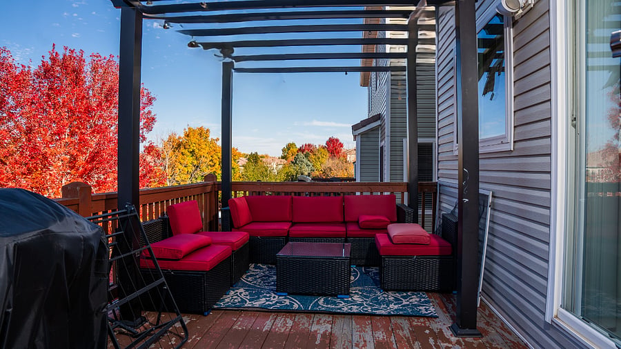 patio with BBQ grill and outdoor sofa seats