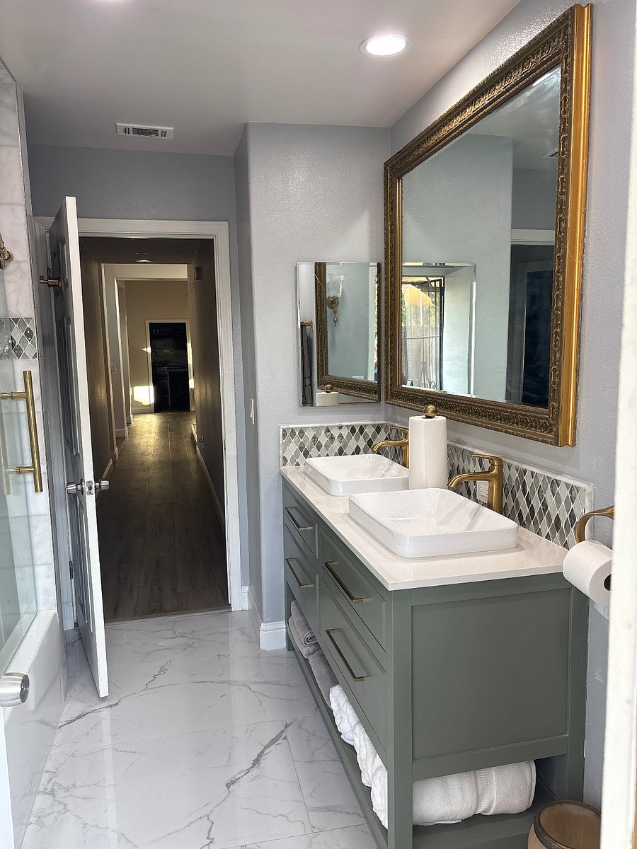 Guest bathroom stocked with initial toiletries and directly adjacent to your private bedroom. It has an exit door to your own private courtyard.
