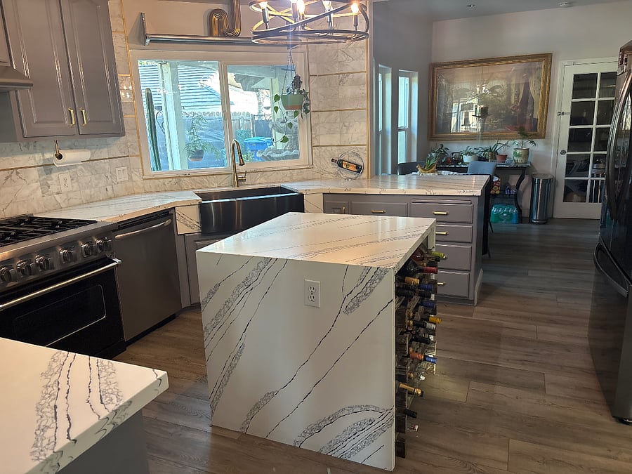Shared gourmet kitchen with wine rack island