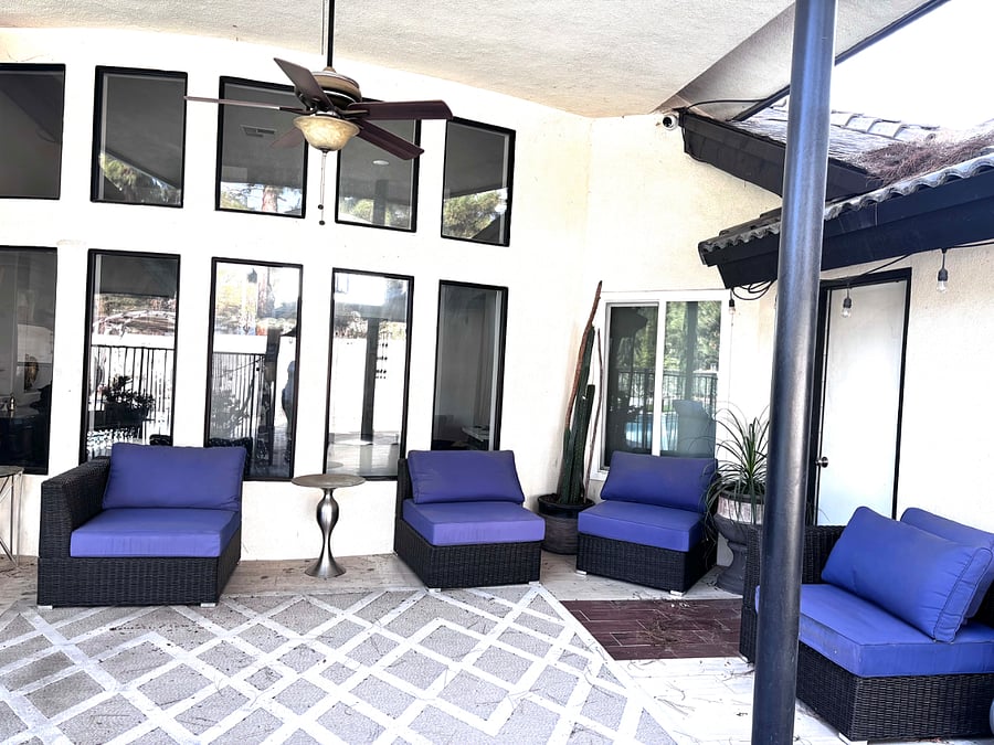 Backyard Patio seating to relax while enjoying a fresh beverage and enjoying the pool.