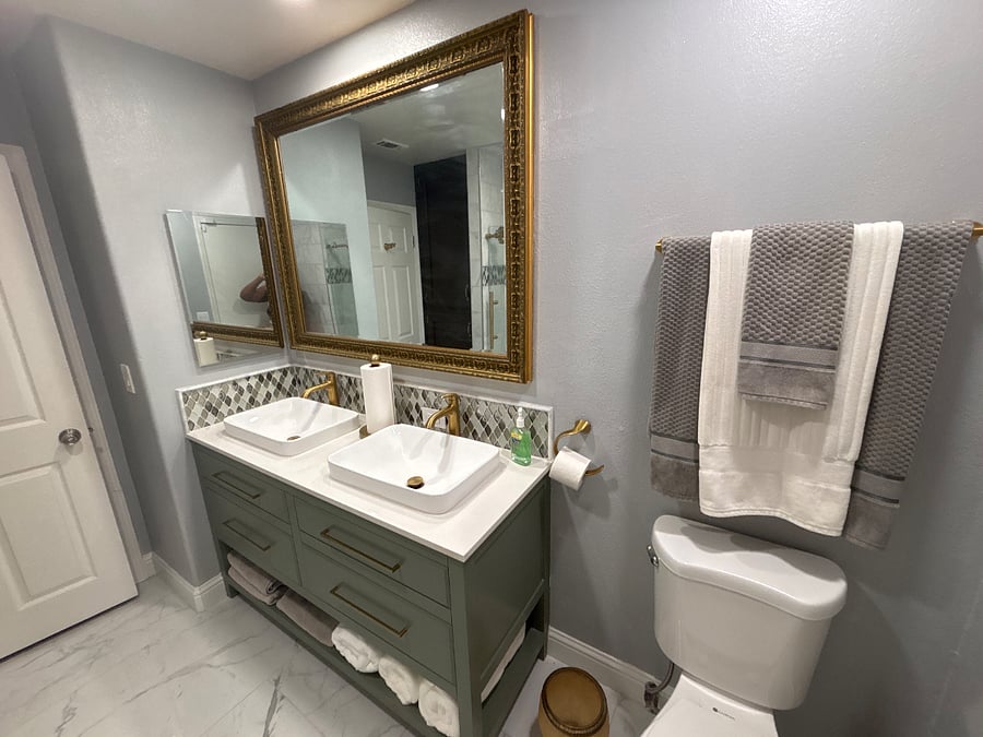 Private guest bathroom with space for extra personal belongings