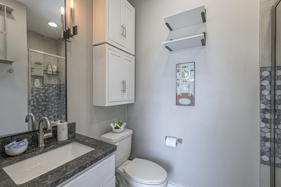 Bright lighting and spa-style finishes for a refreshing start.