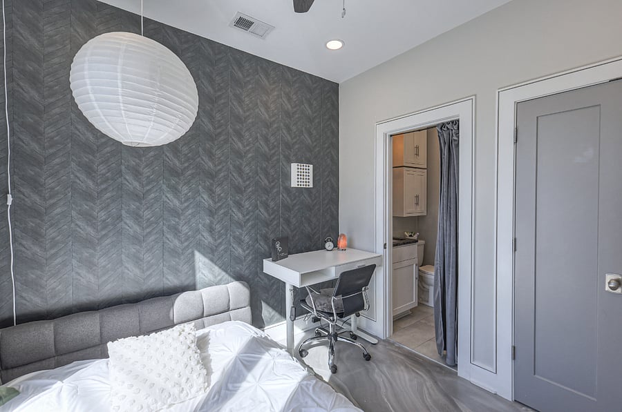 Soft linens and layered pillows for hotel-level comfort.