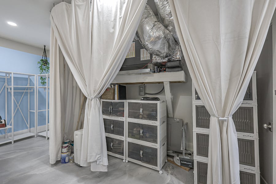 Additional long term storage available behind plush velvet curtains!