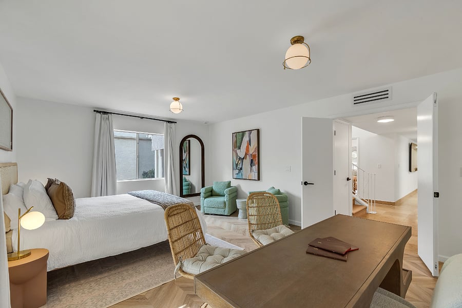 King Master Bedroom with Sitting Area and Designated Workspace