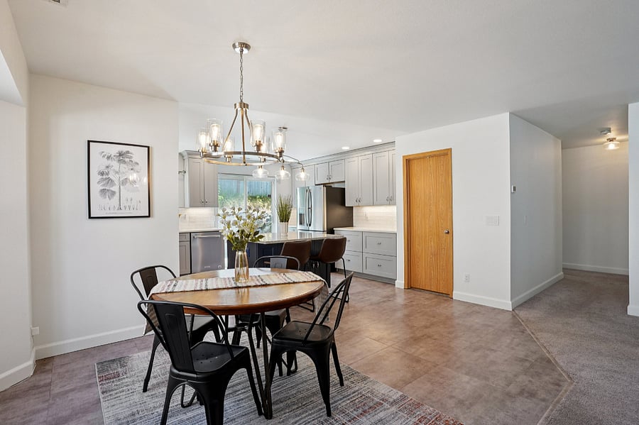 open concept dining room looking into the kitchen