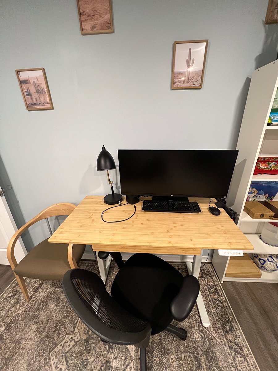 Docking station with a wide screen monitors.