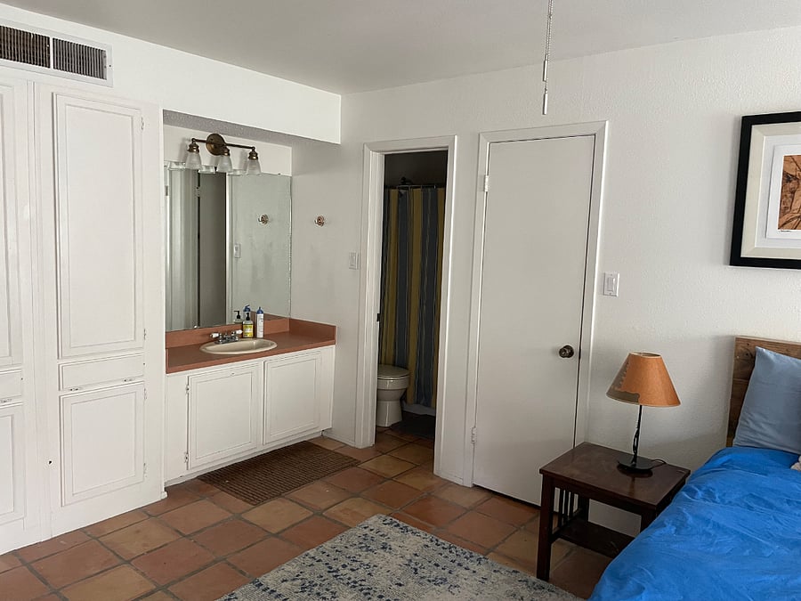 Bathroom sink in Master Bedroom. Doorway is into shower.