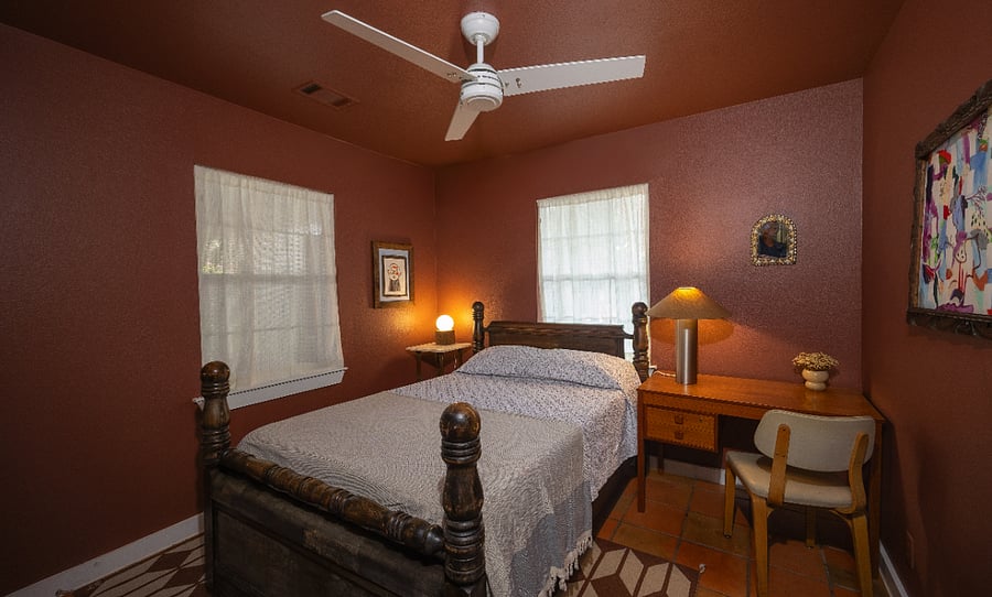 Optional: Bed can be replaced with larger desk space.
