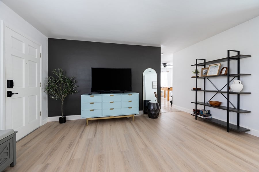 Living room space features a large Smart TV with Roku device so you can sign in to your favorite steaming services.