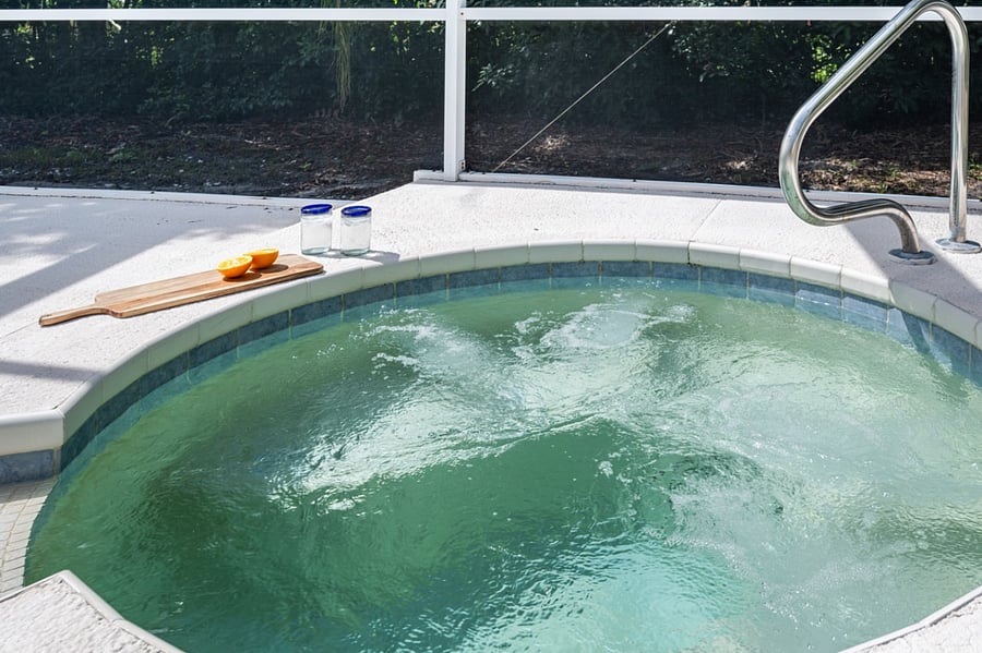 The hot tub provides year-round relaxation.