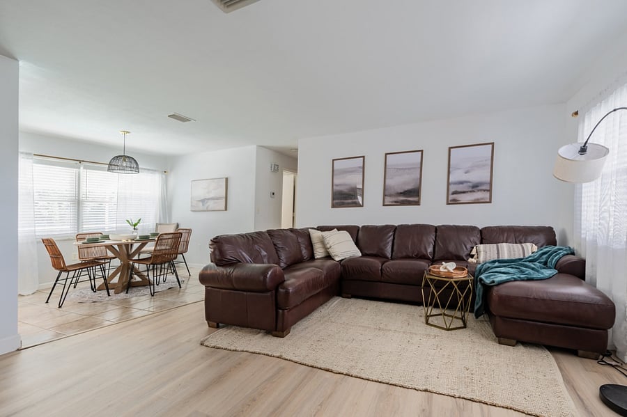 The living room has enough seating for the whole family.