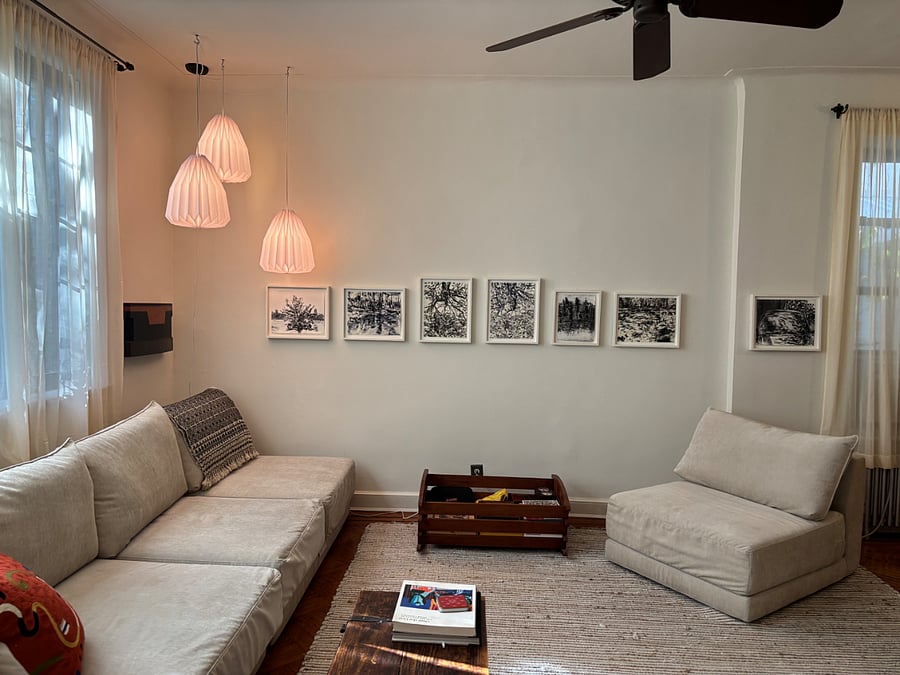 Large living room with comfortable furniture and games and puzzles available.