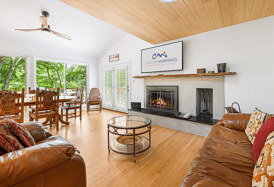 Main Level - Living Area w/ Gas Fireplace & Deck Access