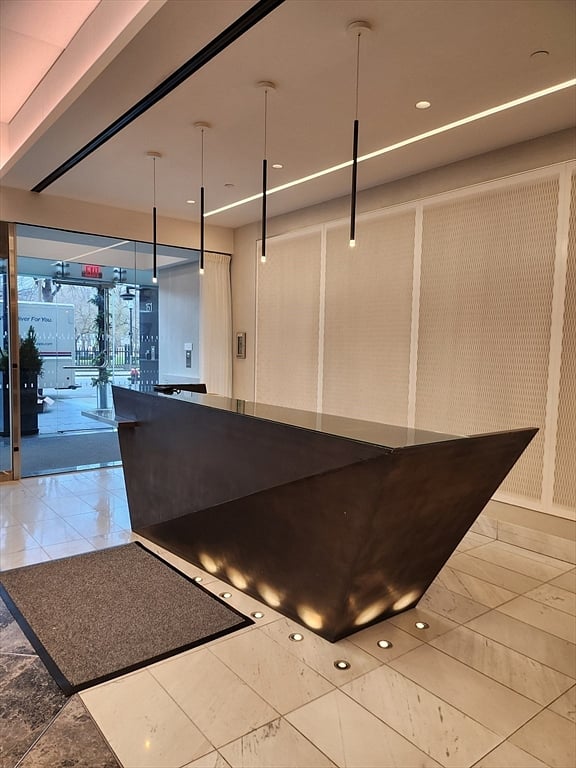 Modern lobby with 24-hour concierge for secure entry and package service.