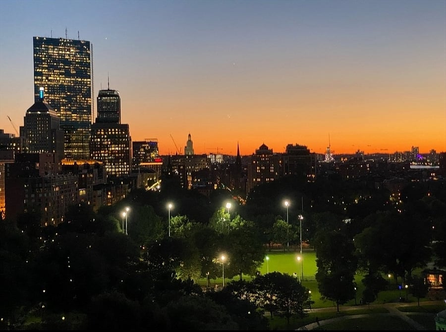 Breathtaking night view of Boston Common and the downtown skyline.