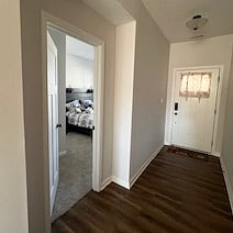 Front door and 2nd bedroom