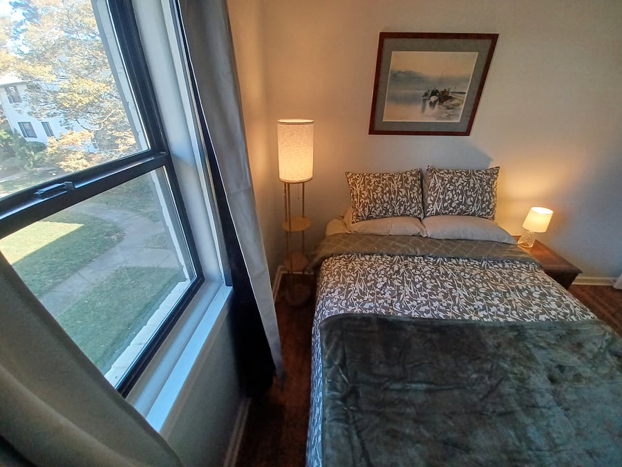 Bedroom with room-darkening...