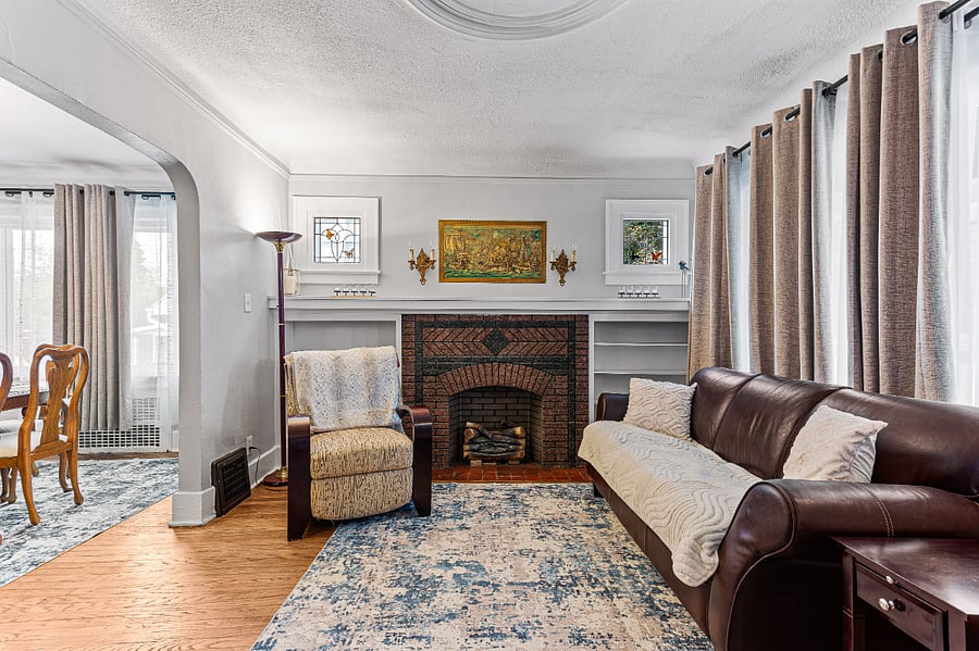 Cozy living room:  Smart TV, ROKU, sound bar, DVD player, blackout curtains, large windows.  