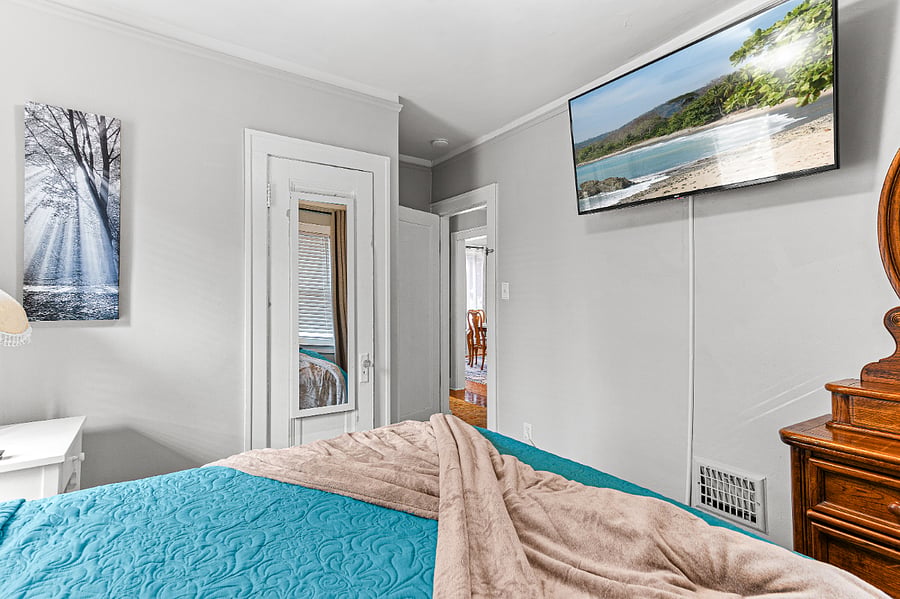 Apt. A Lower Flat Bedroom 3
Bedroom 3:  50 Smart TV, Roku, ceiling fan, blackout curtains, new blinds, full length mirror, dresser & closet for storage.