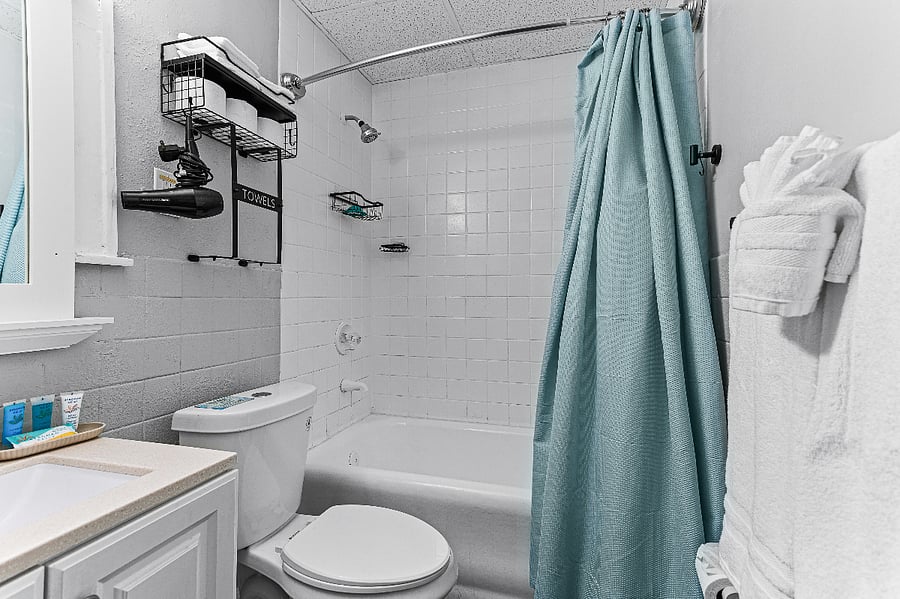 Apt. A Lower Flat Bathroom:  New granite countertop with under mount sink. Exhaust vent. New light fixture.