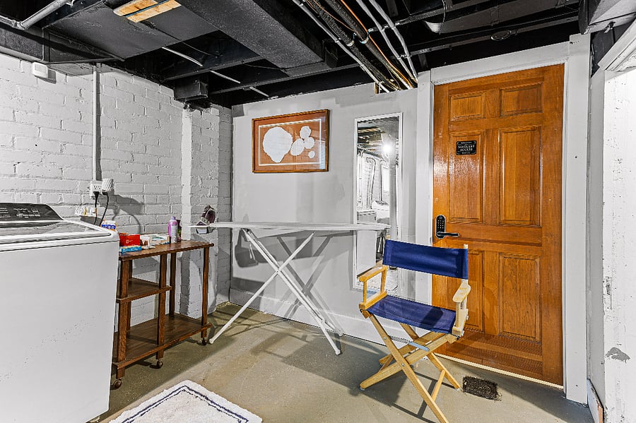 Laundry Center for Apt. B.
Includes an ironing board & iron.