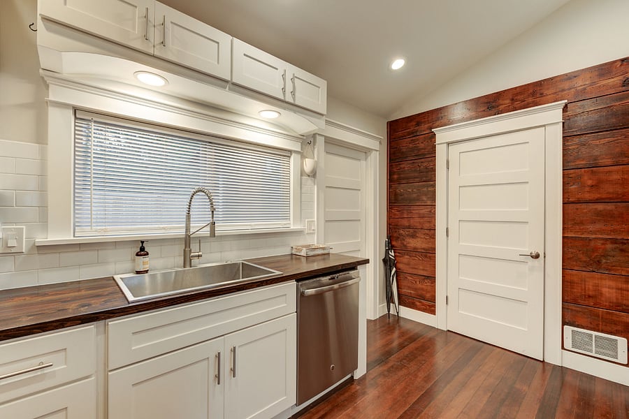 Door on right leads to work from home space. Door on left leads to laundry room and side entrance.