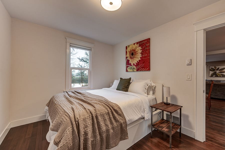 First bedroom with river view, large closet and full length mirror.