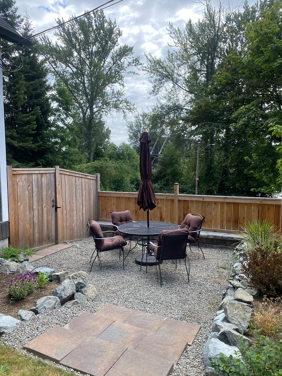 Sunken patio space in front yard.