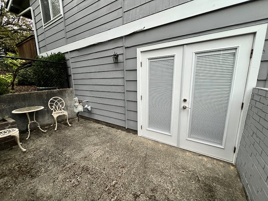 Studio entrance on the side of the house with private patio