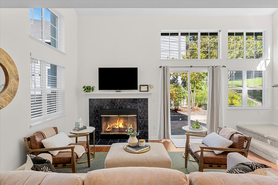 Comfortable seating area with smart TV and cozy fireplace for Portlands rainy evenings.
