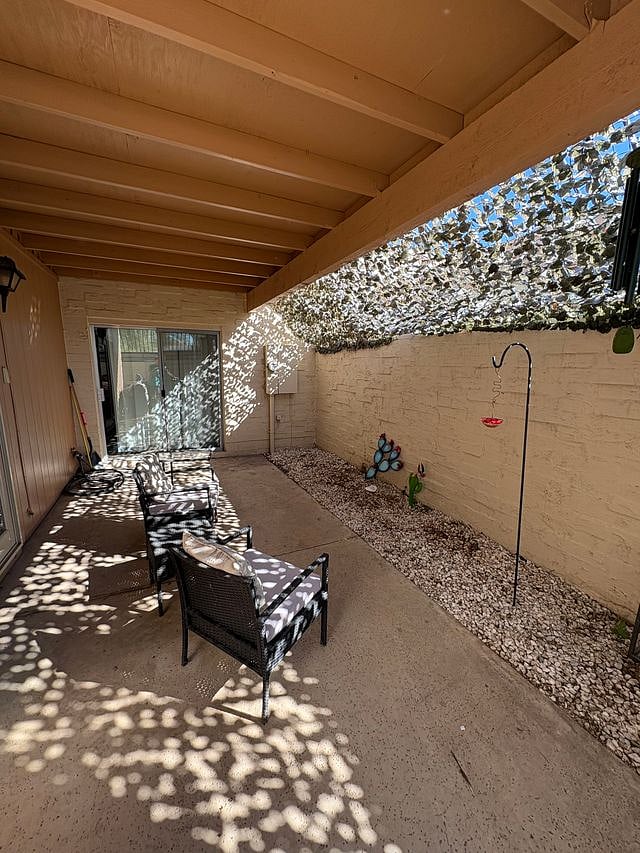 Back patio, partially enclosed