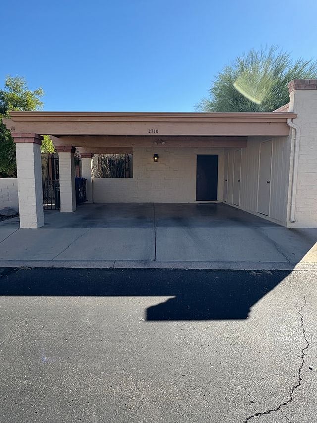 Car port, plenty of room for two cars.